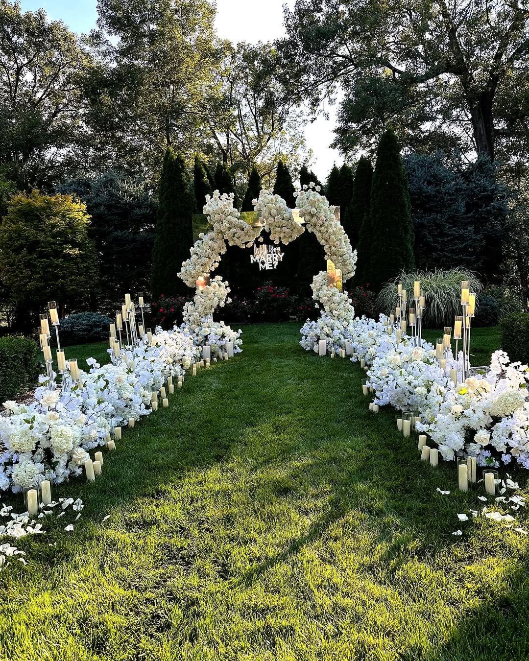 Mirrored frame with white florals by Party Land