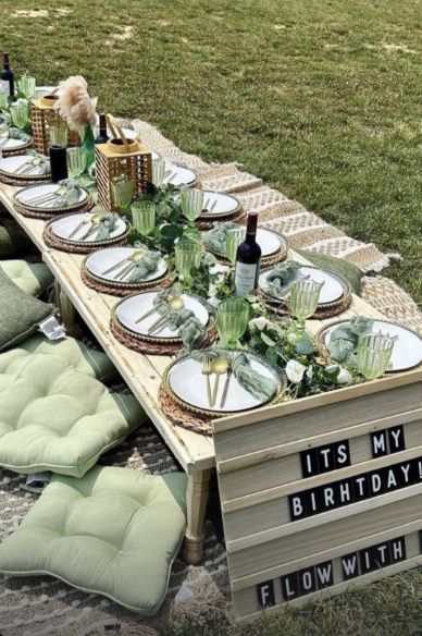 Picnic tables · sage green cushions & table styling